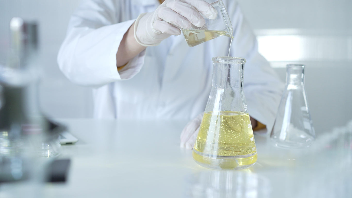 Female chemist blending custom soap